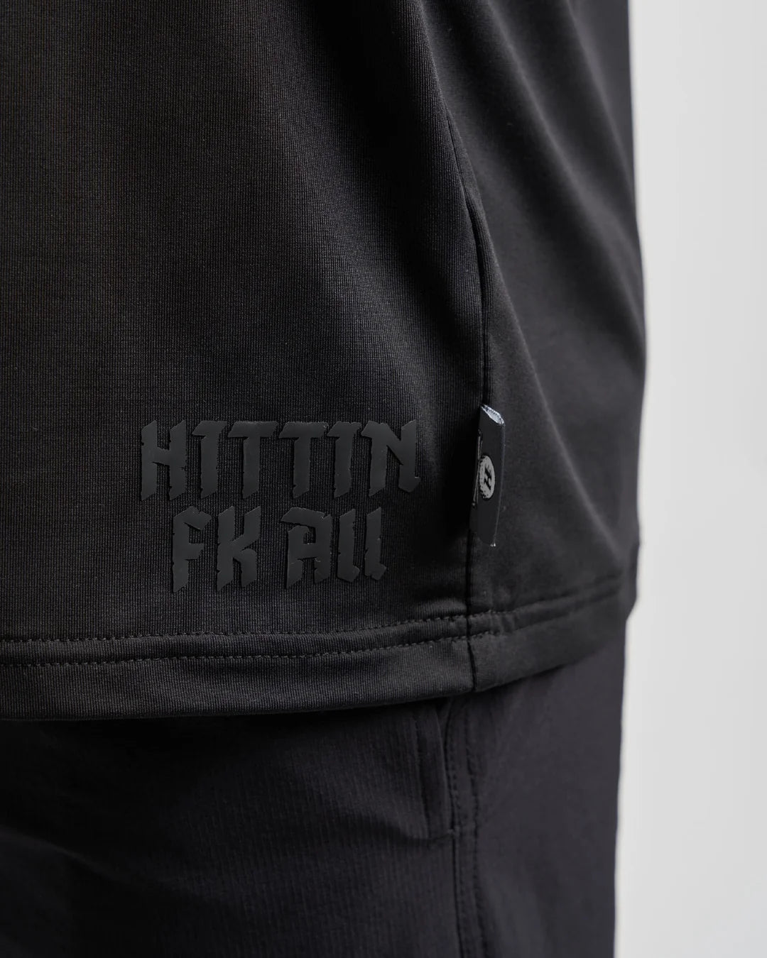 The Mad Hueys Hittin Fk All Short Sleeve Golf Polo | Black