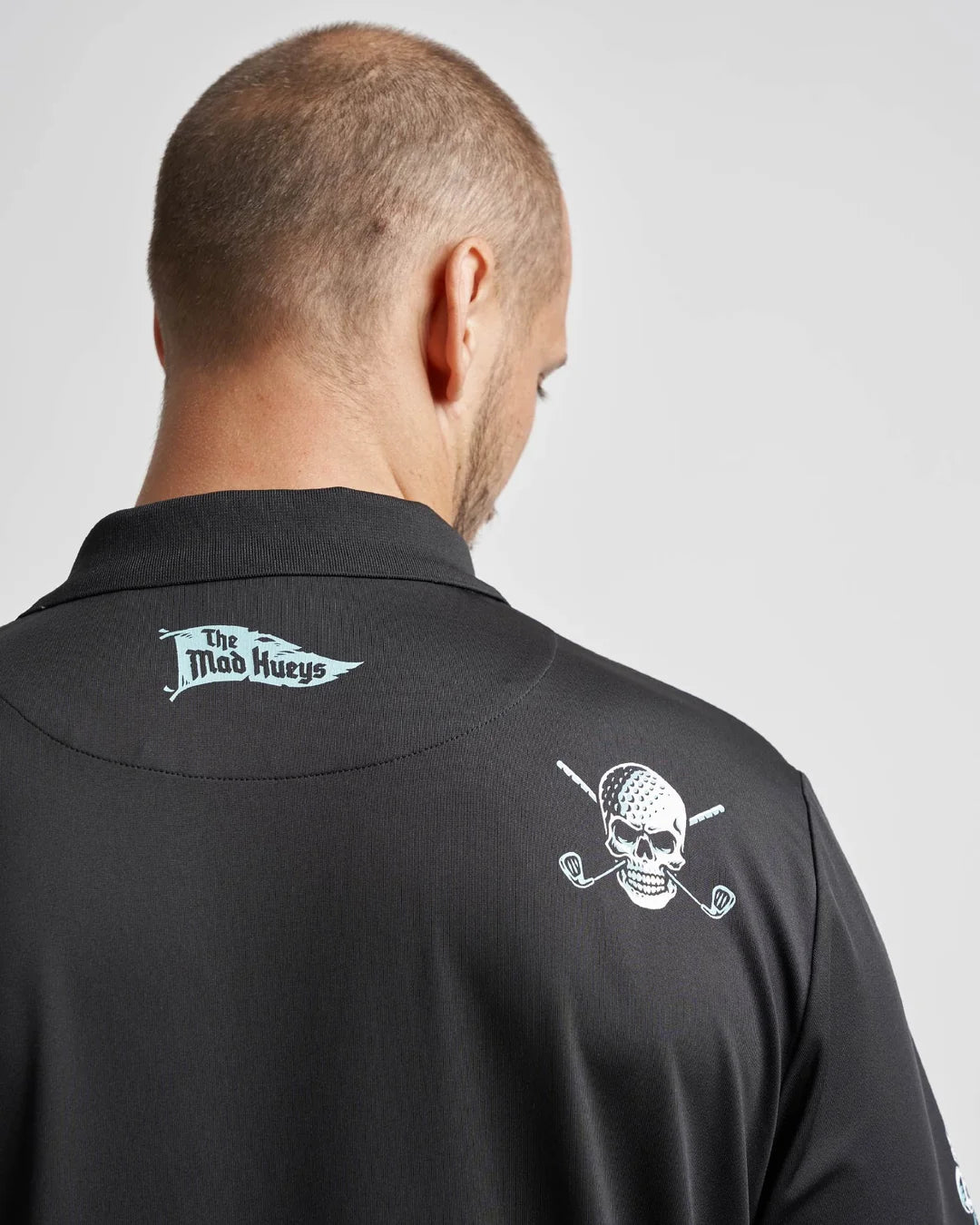 The Mad Hueys Hittin Fk All Short Sleeve Golf Polo | Black