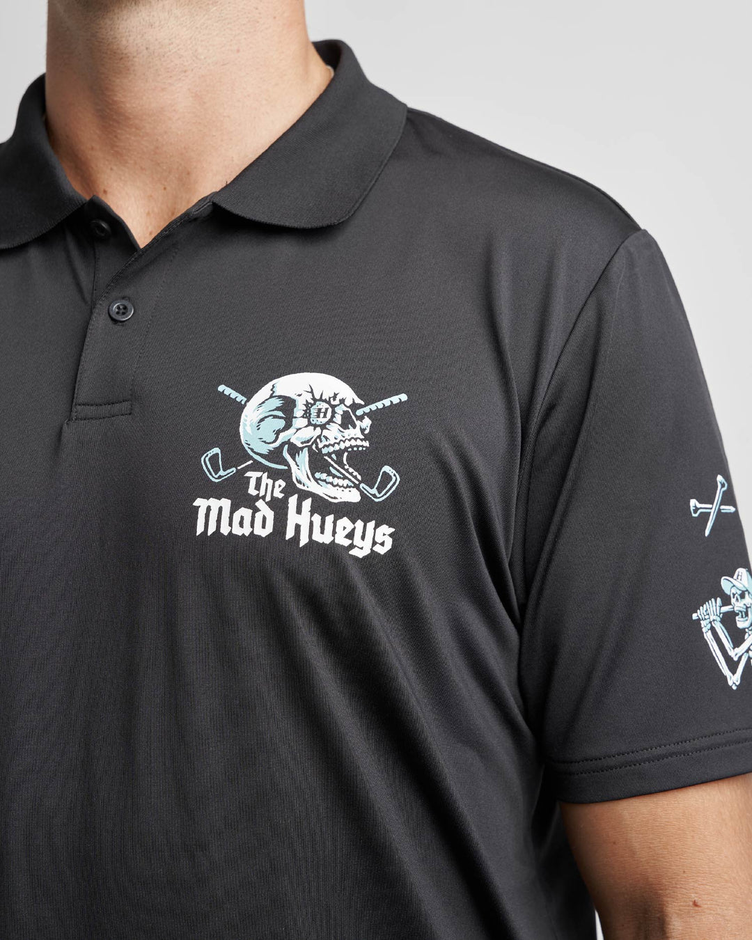 The Mad Hueys Hittin Fk All Short Sleeve Golf Polo | Black